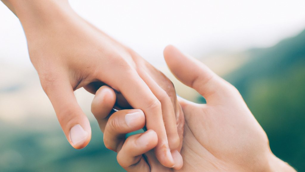 Zwei Hände, die einander halten