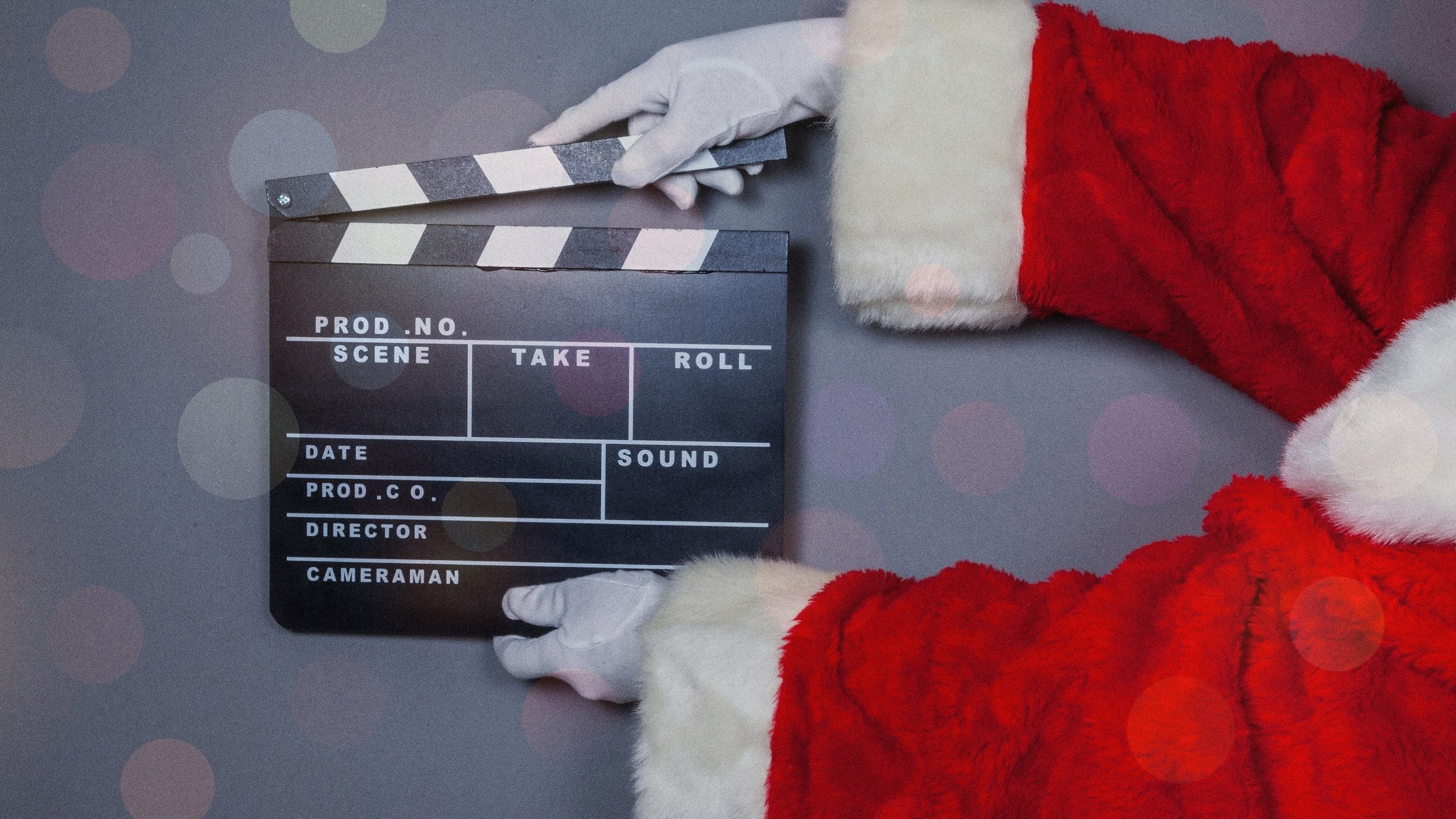 Weihnachtsmann hält Filmklappe