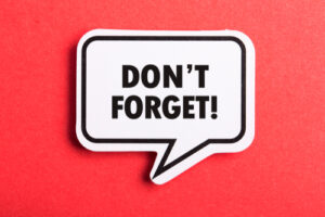Sprechblase mit Text "Dont forget!" auf rotem Hintergrund
